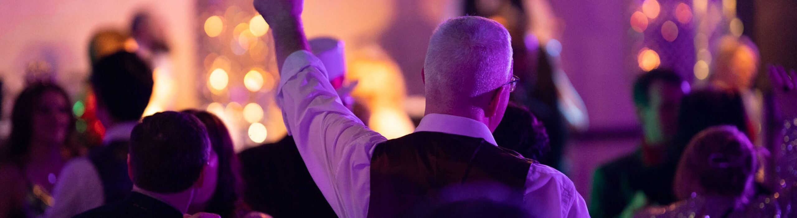 back view of gentleman dancing on dance floor