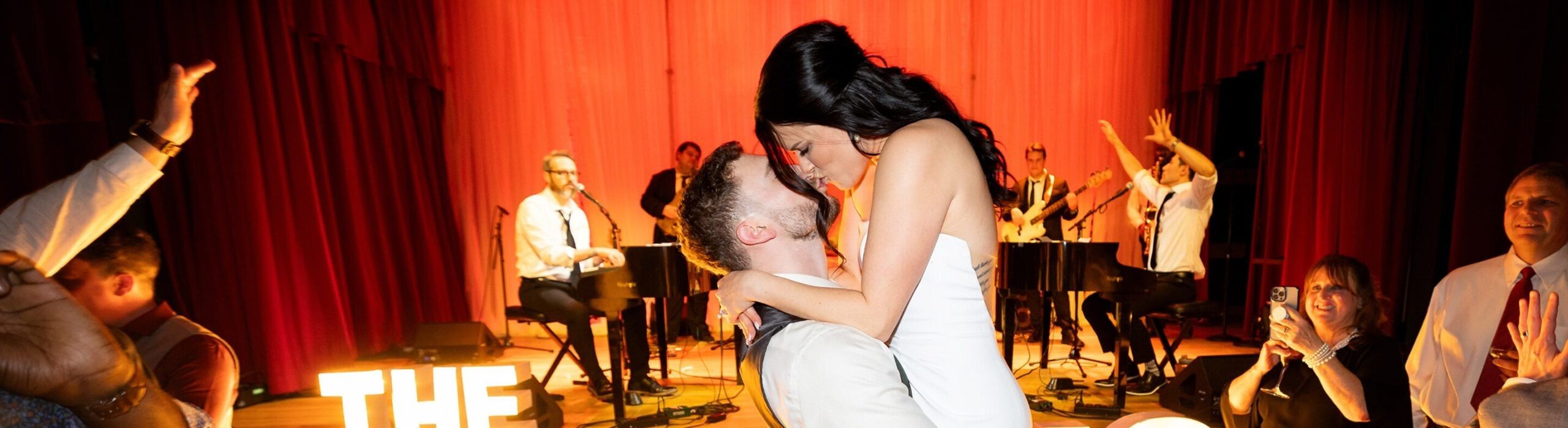 bride and groom kissing at wedding