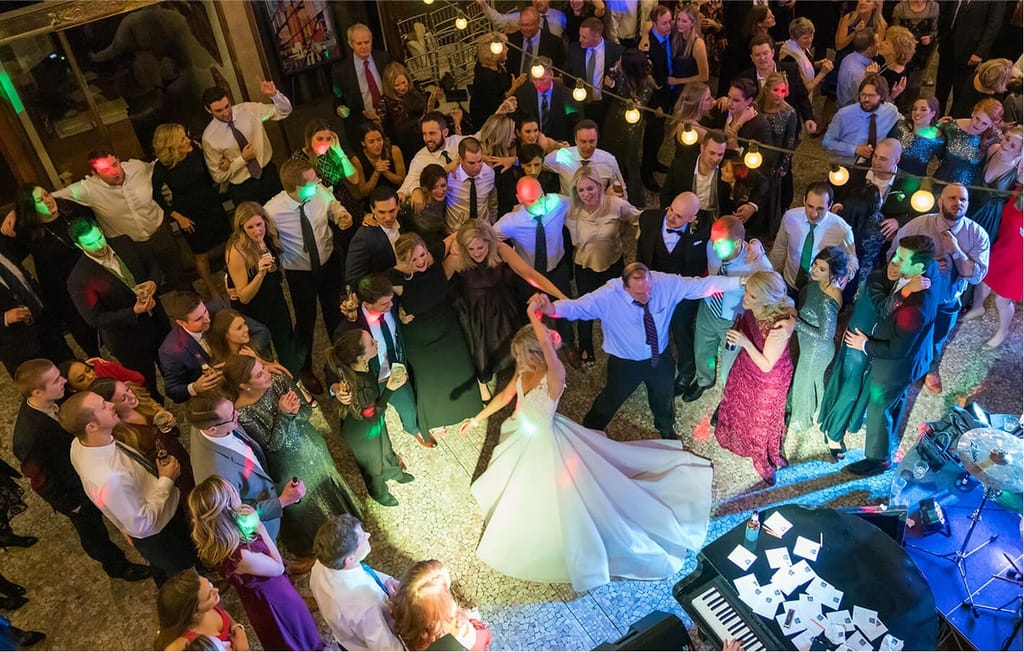 aerial view of friends and family dancing on dance floor